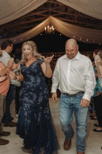 Couple showing off their fall fashion choices at a reception at All4One Farms in Jacksonville, FL.