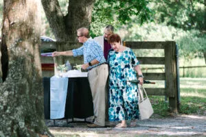 Wedding guest enter the ceremony area from the parking lot at All4One Farms