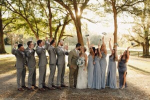 Wedding party under the oak trees at All4One Farms