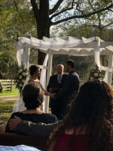 Bride and Groom saying their vows at All4One Farms Jacksonville, FL