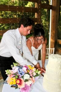 Bride and groom cutting cake at Jax wedding venue