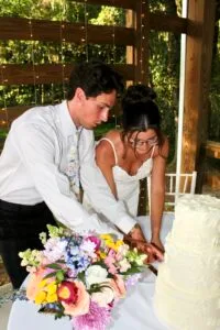 Bride and groom cutting cake at Jax wedding venue