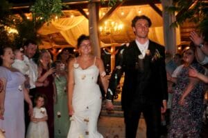 Bride and groom leaving their reception at Jacksonville wedding venue.