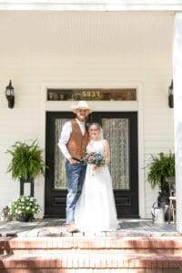 Bride and Groom on porch at Jax wedding venue