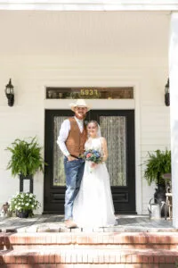 Bride and Groom on porch at Jax wedding venue